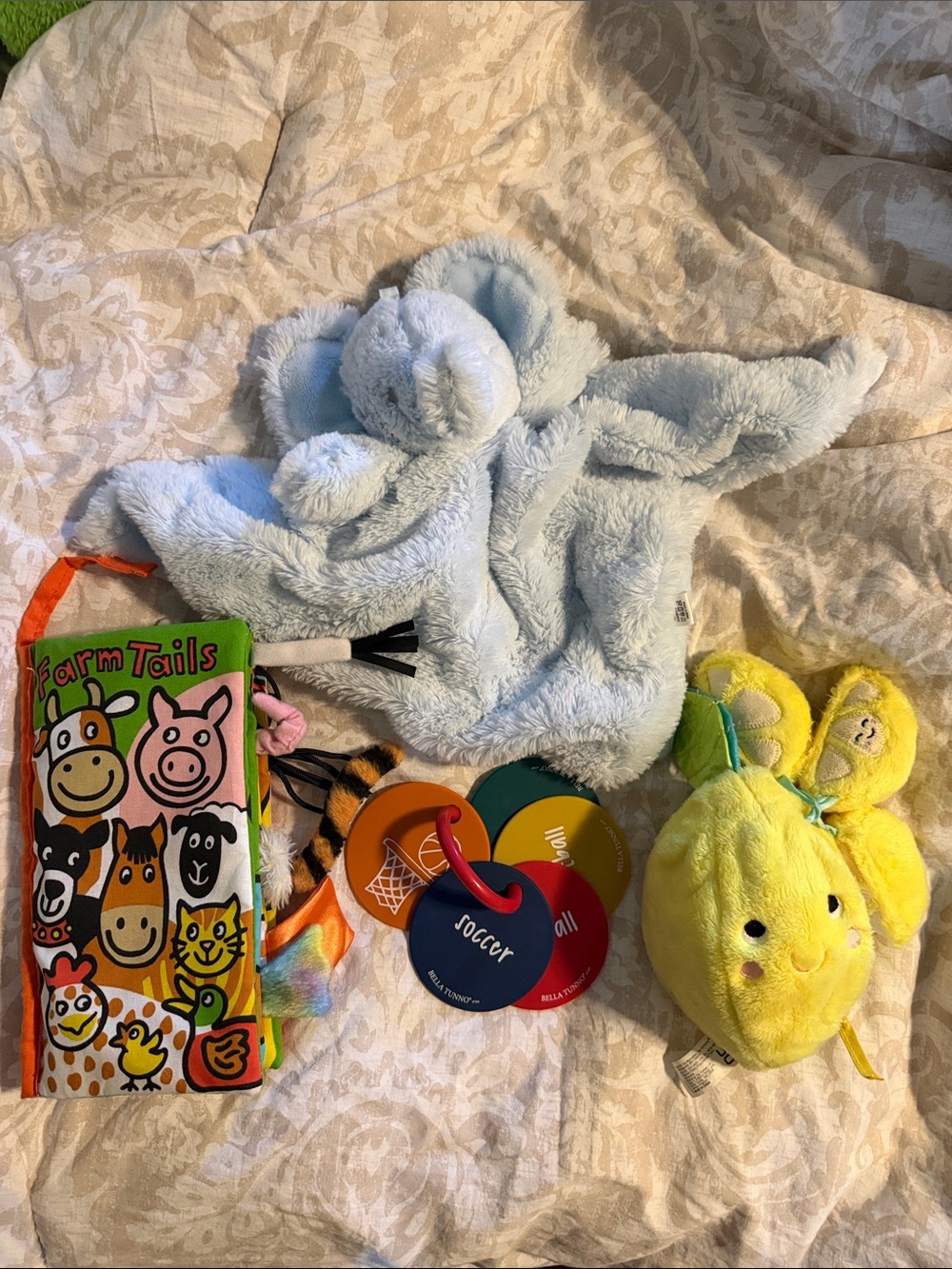 NWOT newborn toys:Jellycat Crinkle book, crinkle lemon, silicone rings, elephant